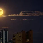 Brazil sees orange full moon rise over Campo Grande